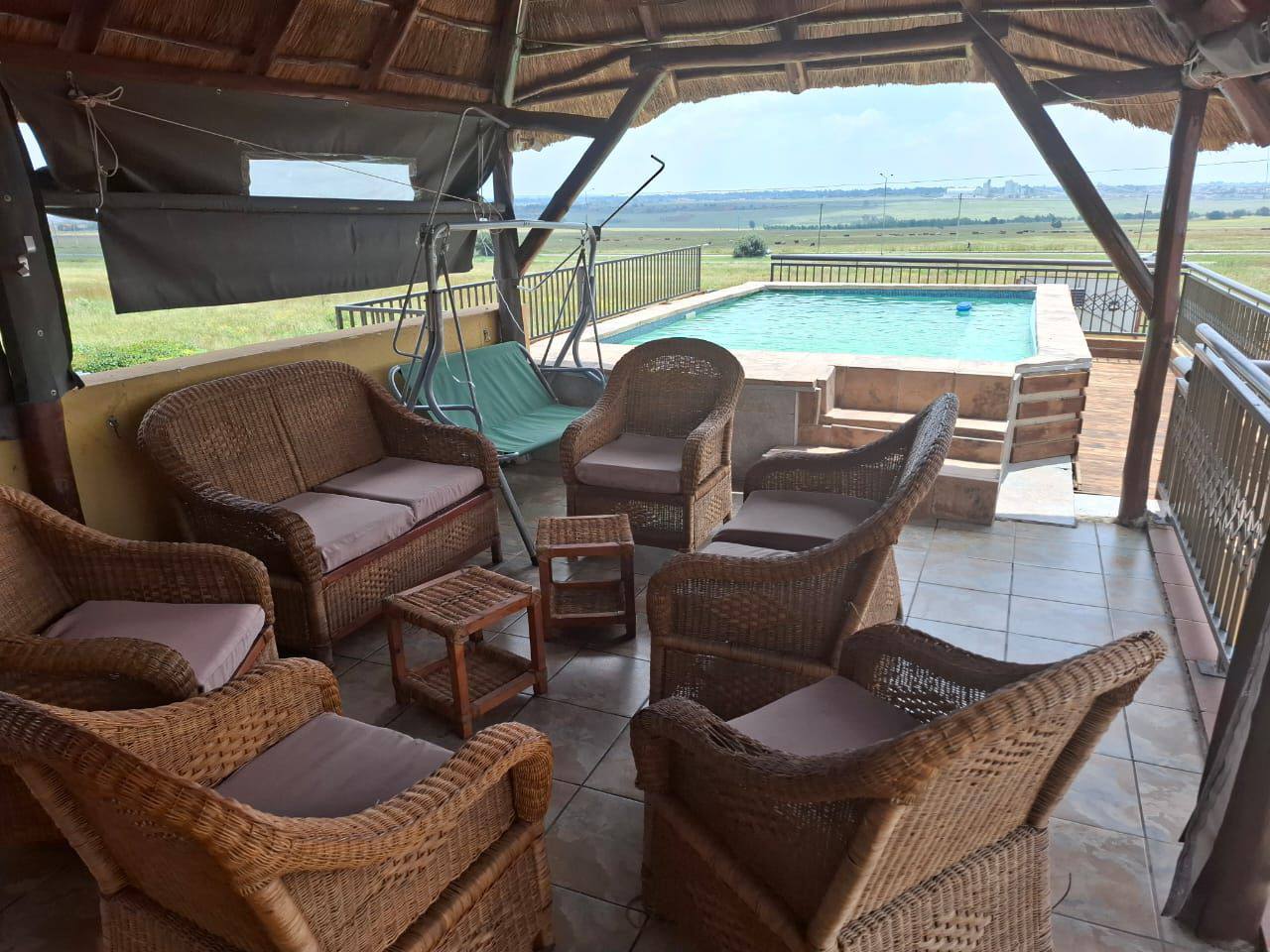 Lapa lounge seating and pool at Mohlakeng Guest House