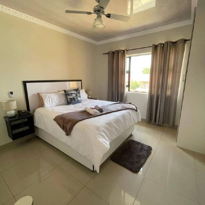 Bright executive room interior at Mohlakeng Guest House